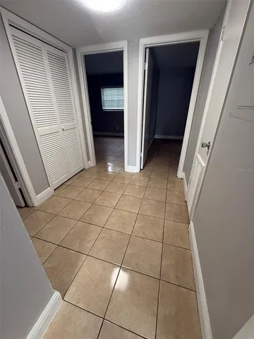 a view of a utility room with windows