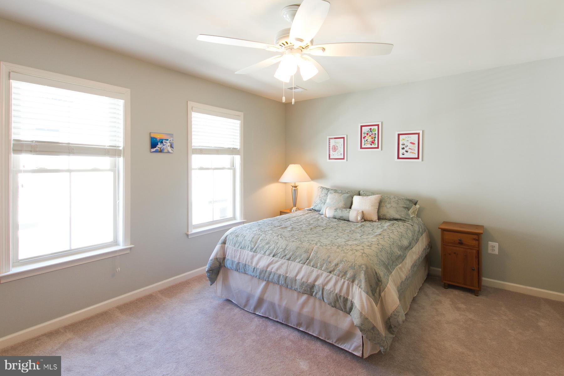 3419 Kemper Road Arlington, VA 22206 - Photo 11 of 30 a bedroom with a bed and a window