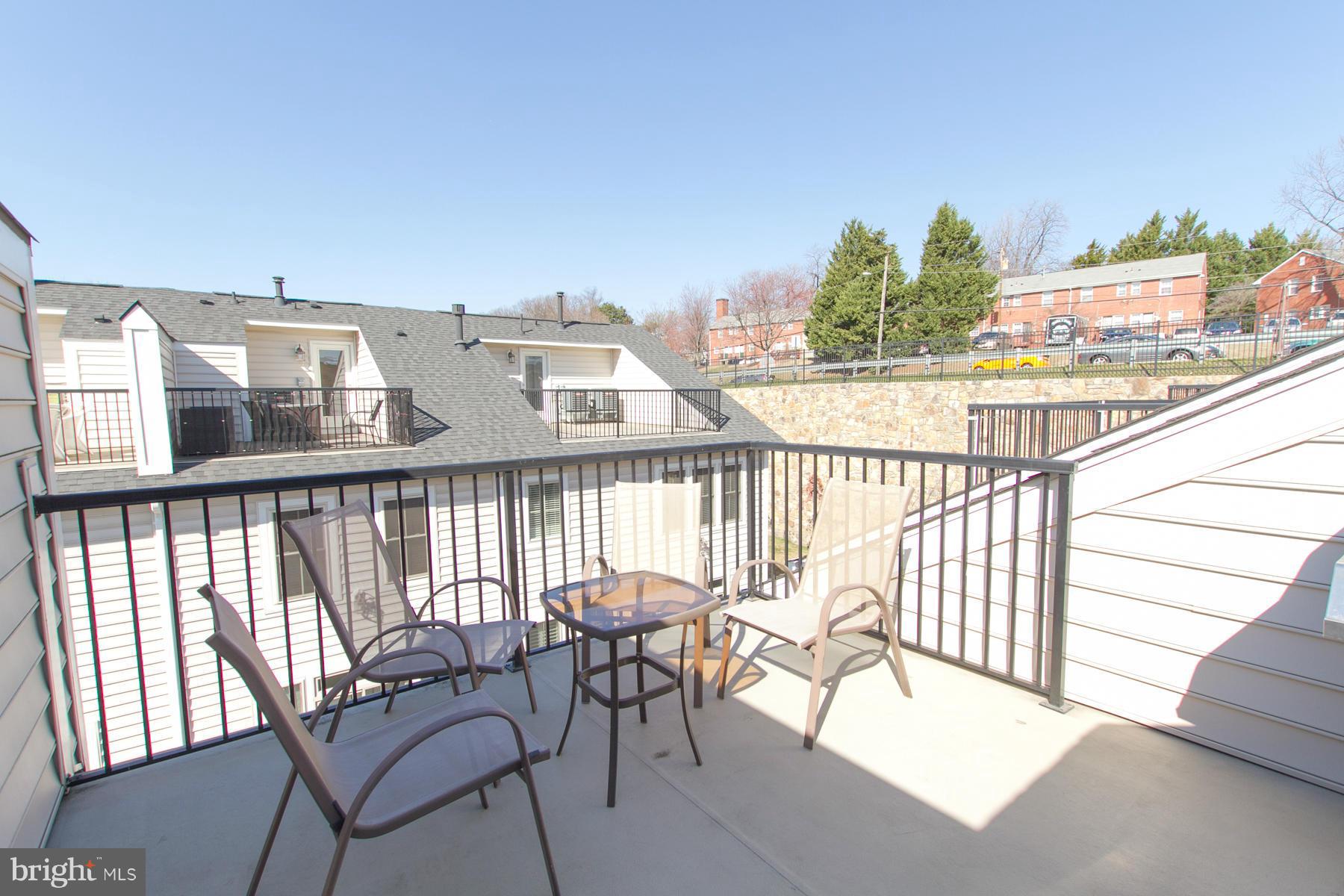 3419 Kemper Road Arlington, VA 22206 - Photo 21 of 30 a view of a balcony with chairs