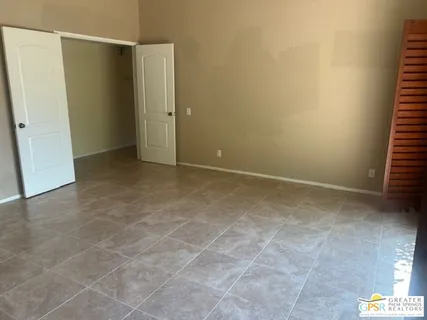 a view of a room with windows