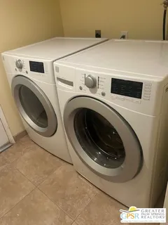 a view of a swimming pool with a lake view