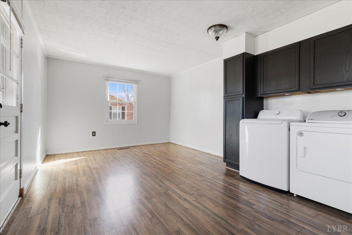 813 Doss Road Concord, VA 24538 - Photo 15 of 31 a view of a kitchen with wooden floor and electronic appliances