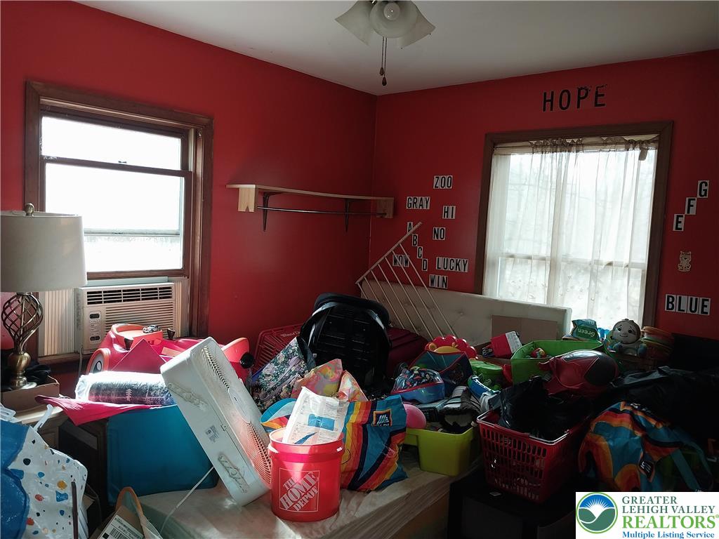2108 Fox Road Bushkill, PA 18324 - Photo 17 of 98 a bedroom with furniture and a potted plant