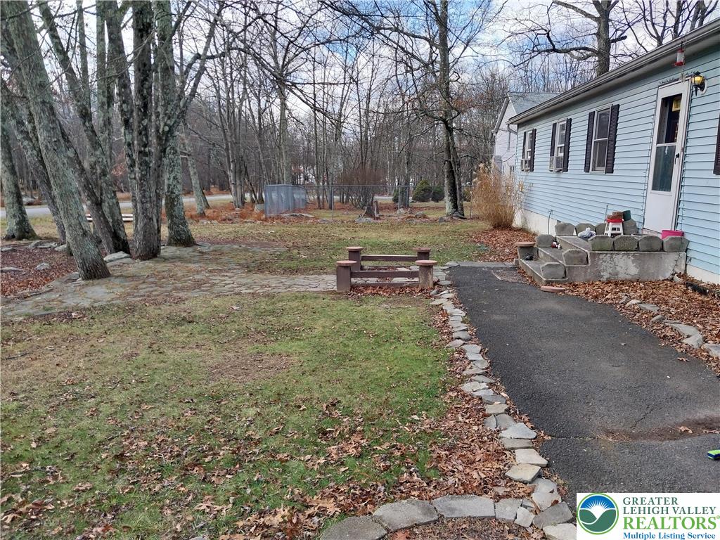 2108 Fox Road Bushkill, PA 18324 - Photo 2 of 98 a view of a yard with a house