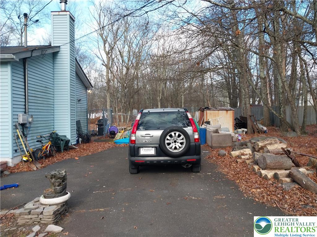 2108 Fox Road Bushkill, PA 18324 - Photo 3 of 98 a car parked in front of a house