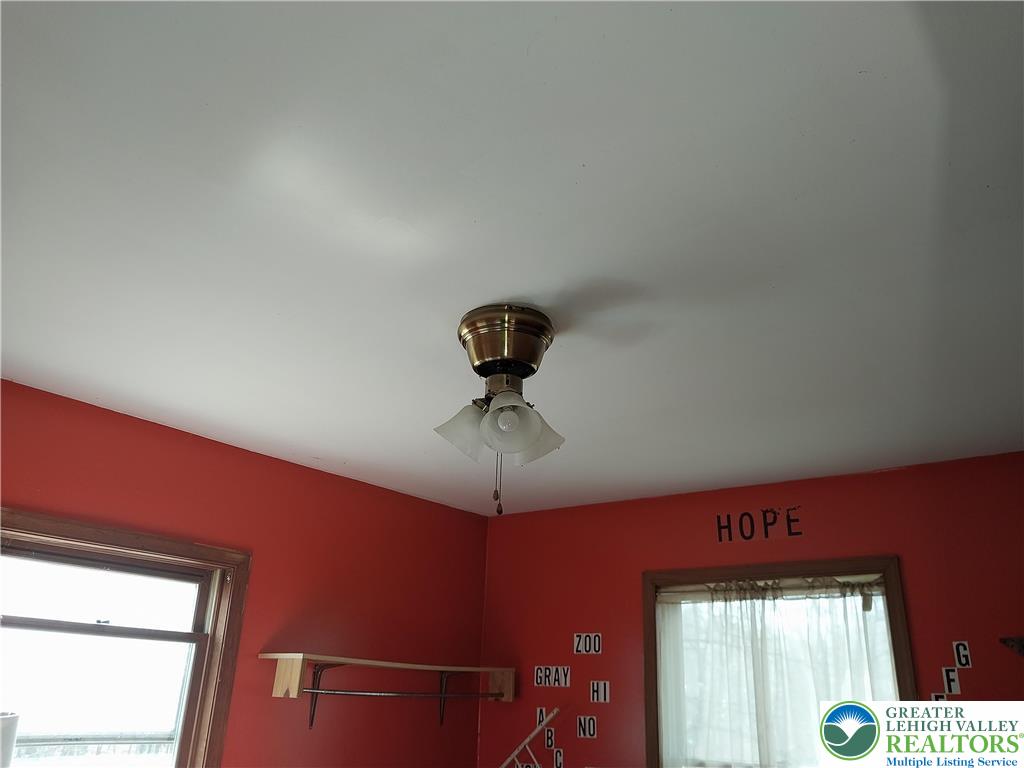 2108 Fox Road Bushkill, PA 18324 - Photo 32 of 98 a room with a chandelier