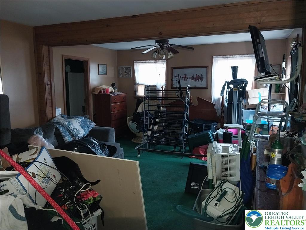 2108 Fox Road Bushkill, PA 18324 - Photo 39 of 98 a room with lots of different colored cloths