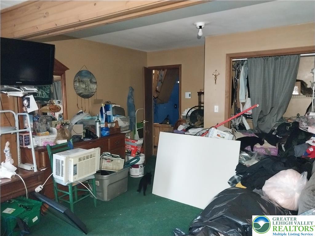 2108 Fox Road Bushkill, PA 18324 - Photo 41 of 98 a room with furniture a flat screen tv and a window