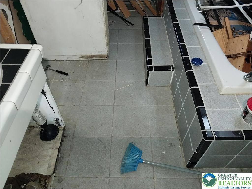 2108 Fox Road Bushkill, PA 18324 - Photo 44 of 98 a bathroom with a sink and glass door