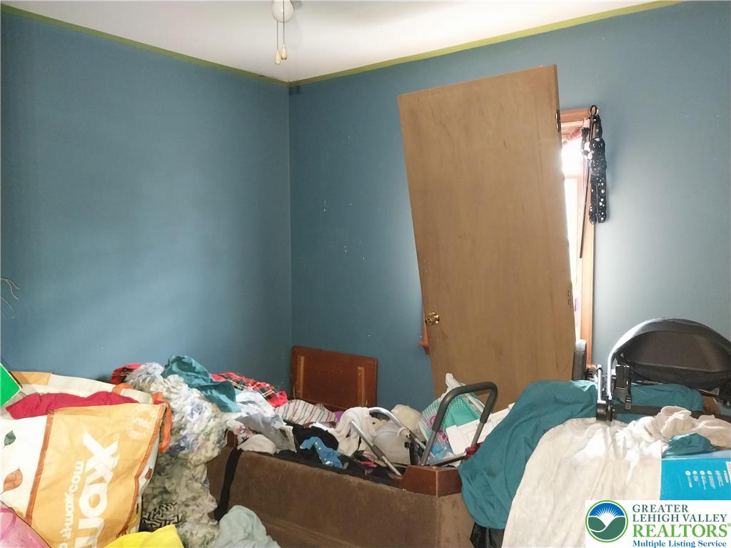 2108 Fox Road Bushkill, PA 18324 - Photo 45 of 98 a bedroom with a bed and a couch