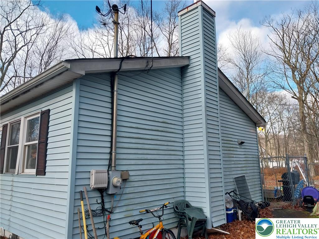2108 Fox Road Bushkill, PA 18324 - Photo 6 of 98 a backyard of a house with seating space