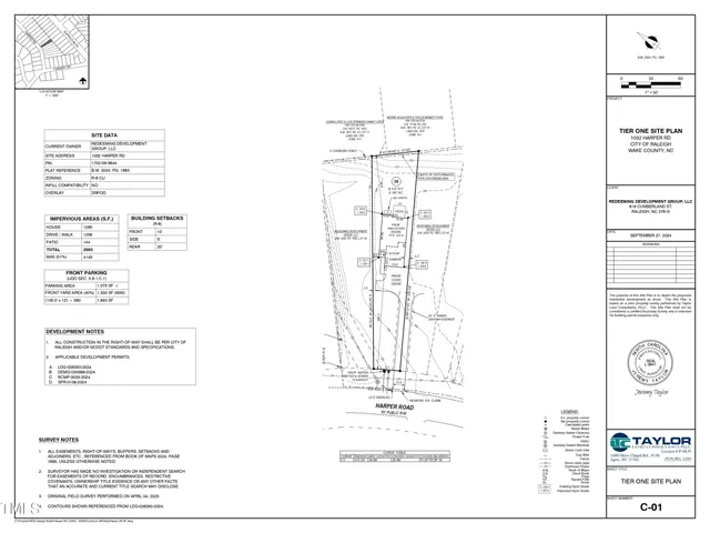 a front view of residential houses with yard and swimming pool