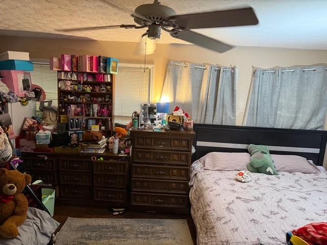 6495 Revena Drive Morrow, GA 30260 - Photo 14 of 14 a bedroom with a bed and a window