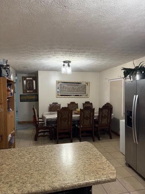 6495 Revena Drive Morrow, GA 30260 - Photo 6 of 14 a living room with lots of furniture and a refrigerator
