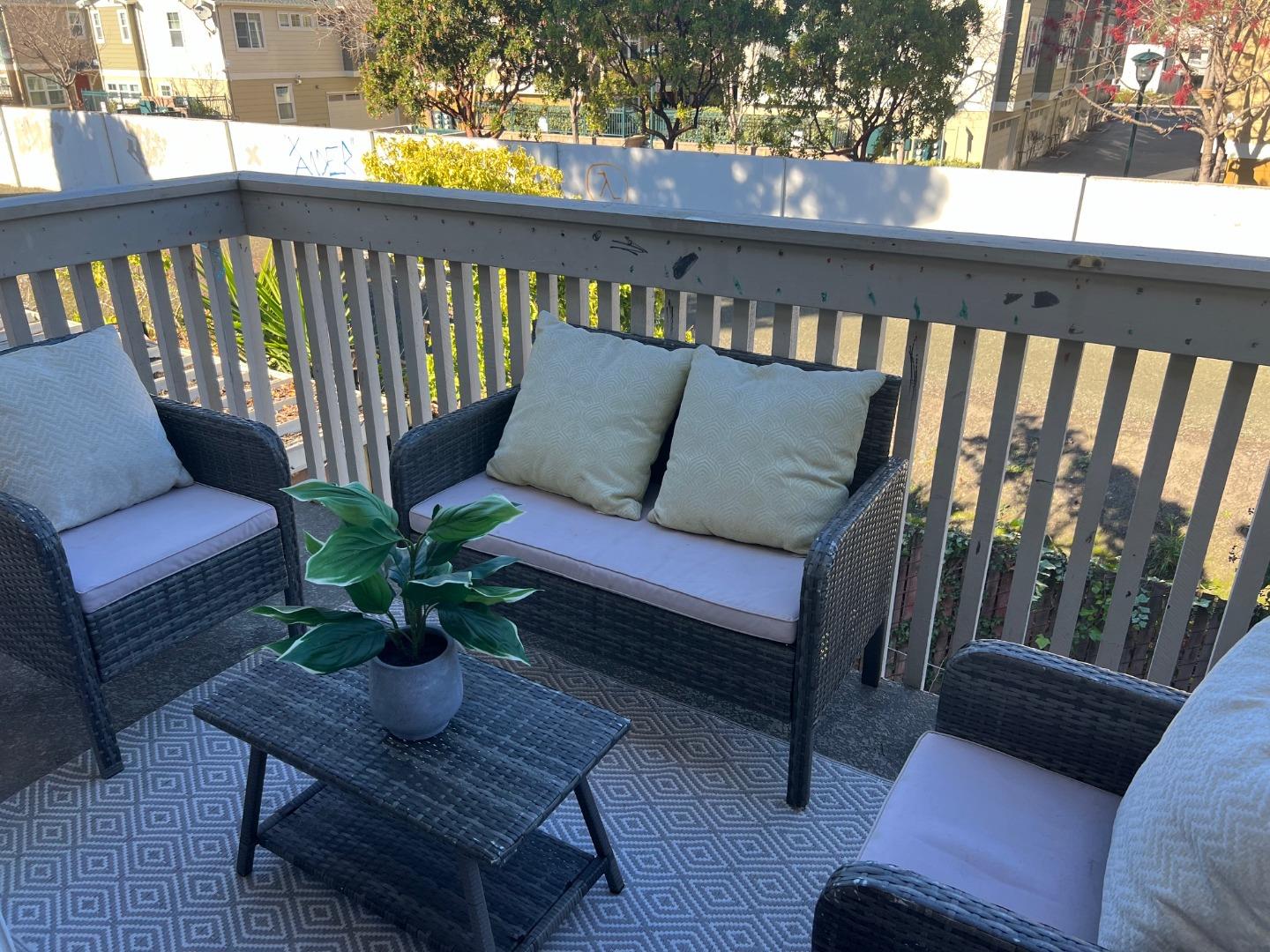 1119 Reed Avenue, Unit C Sunnyvale, CA 94086 - Photo 16 of 20 a view of a balcony with furniture