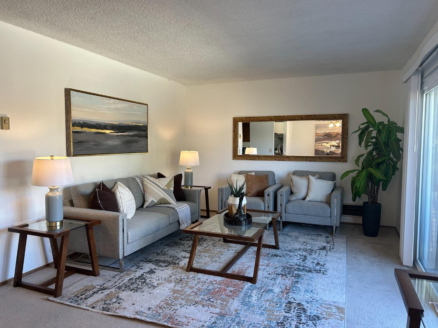1119 Reed Avenue, Unit C Sunnyvale, CA 94086 - Photo 4 of 20 a living room with furniture and a potted plant