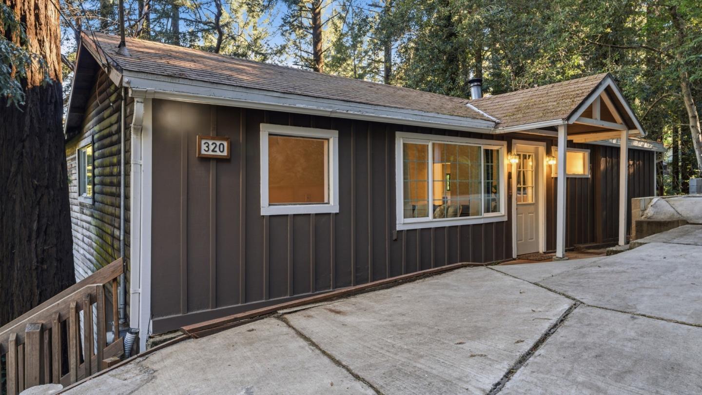 320 Fireside Road Boulder Creek, CA 95006 - Photo 24 of 45 a front view of a house with a porch