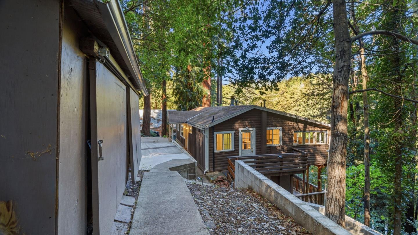 320 Fireside Road Boulder Creek, CA 95006 - Photo 25 of 45 a view of a small yard in front of a house with wooden fence