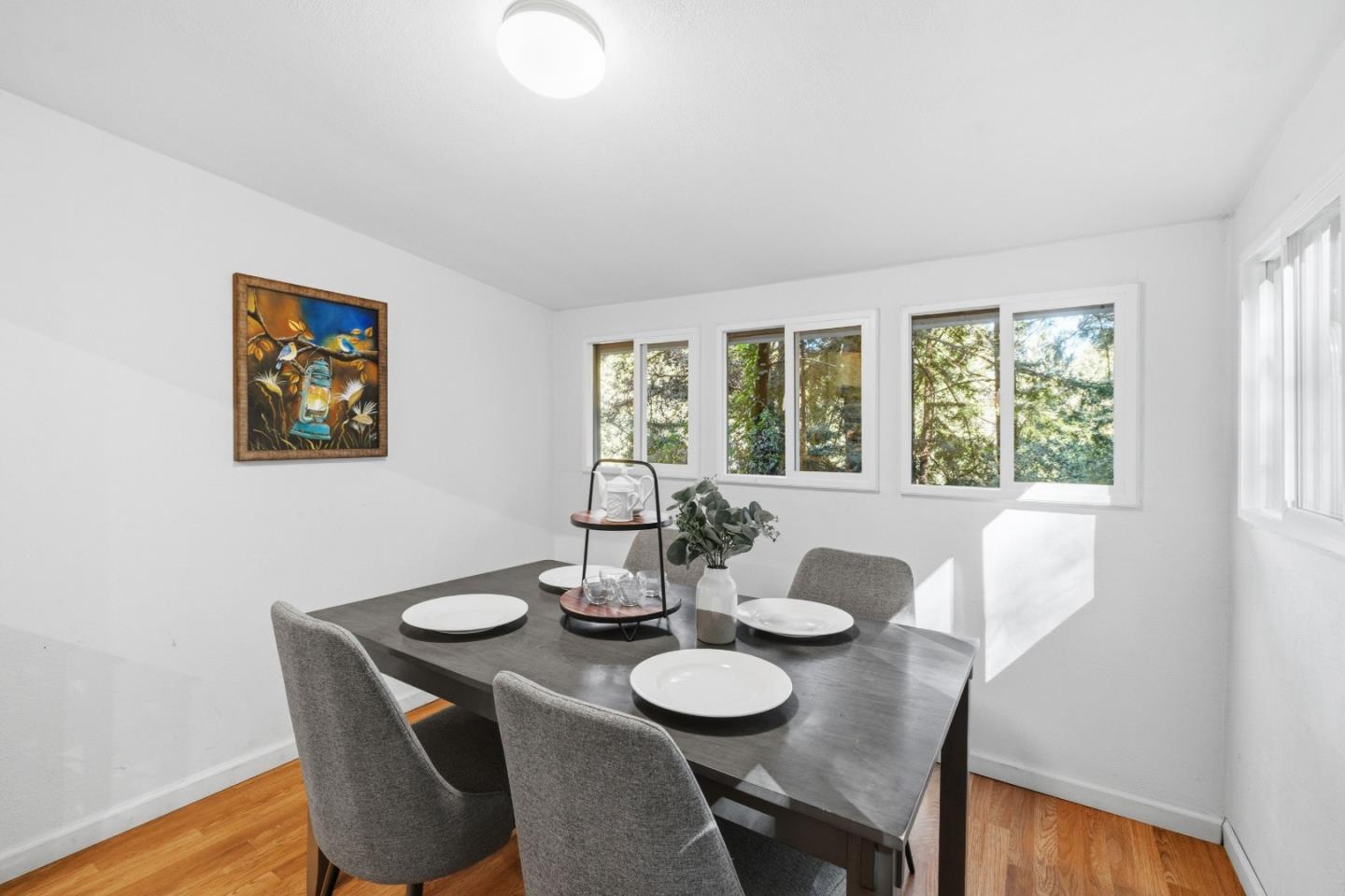 320 Fireside Road Boulder Creek, CA 95006 - Photo 9 of 45 a view of a dining room with furniture window and wooden floor