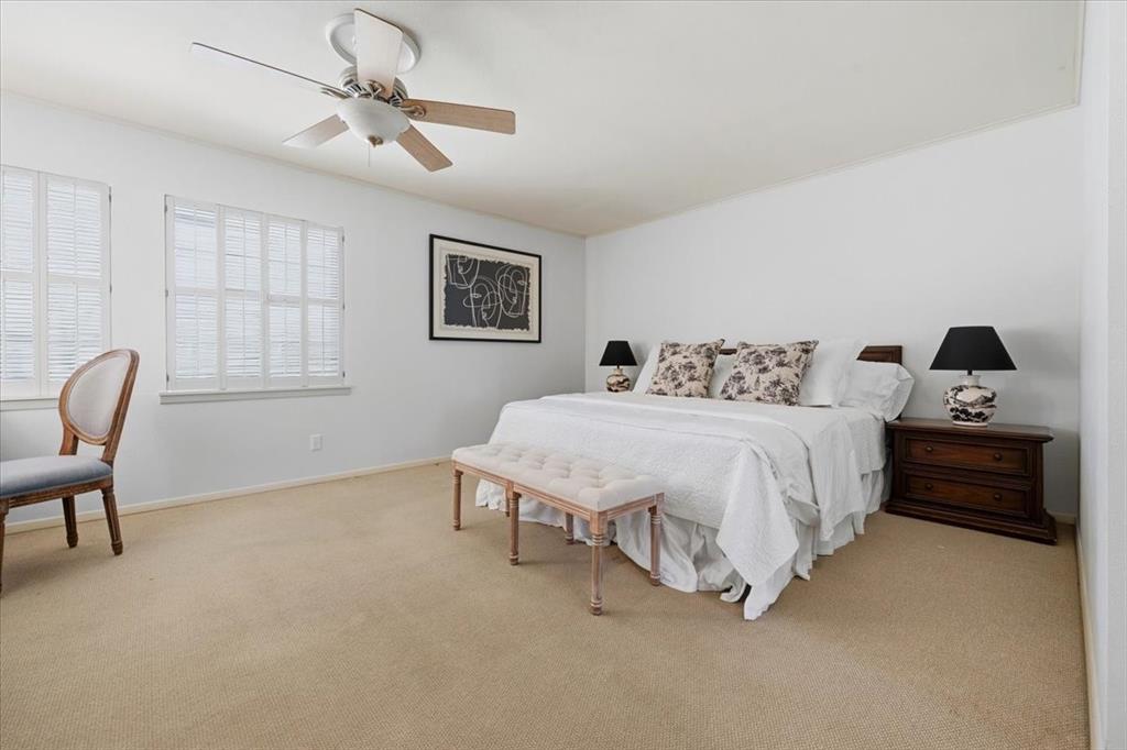 6321 Greenway Road Fort Worth, TX 76116 - Photo 28 of 40 Bedroom featuring a ceiling fan and light carpet