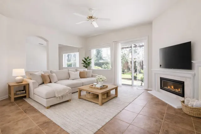 a view of a kitchen with furniture and a fireplace