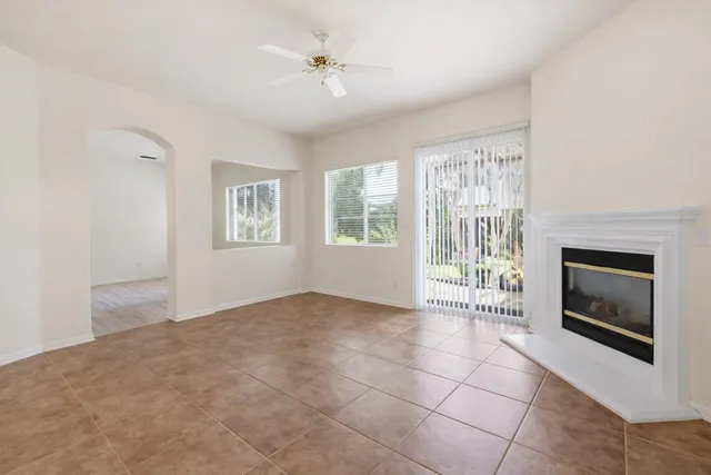 a kitchen with a refrigerator and a sink