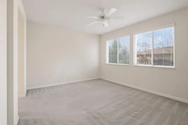 an empty room with windows