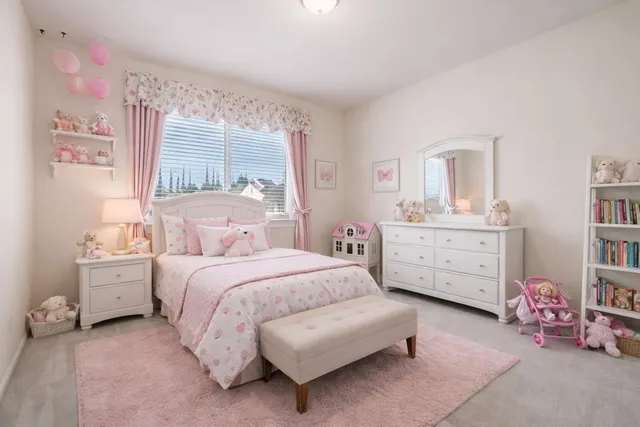 a view of a workspace with furniture and cabinet