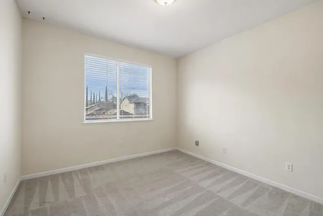 a view of workspace with furniture and window