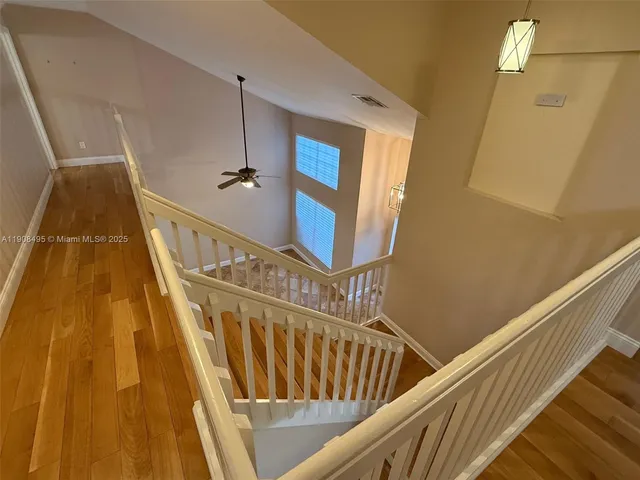 a view of entryway with wooden floor