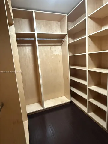 a view of a lake with a house