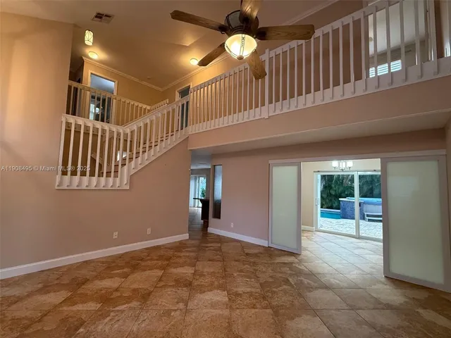 a view of an entryway with a livingroom