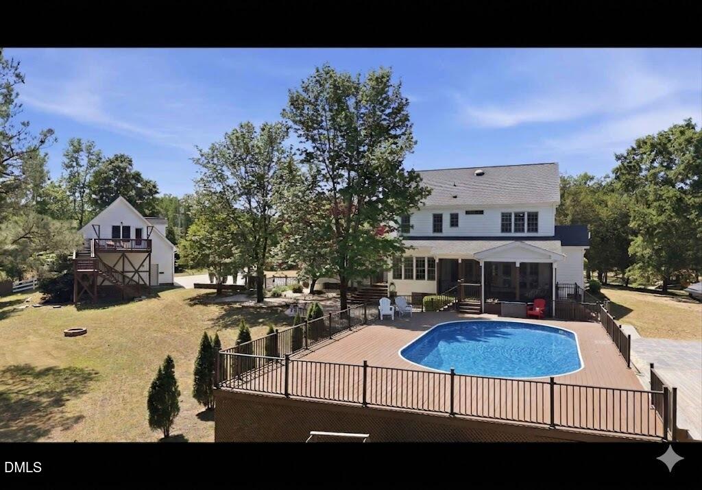5416 Pulley Town Road Zebulon, NC 27597 - Photo 6 of 74 a view of swimming pool with outdoor seating