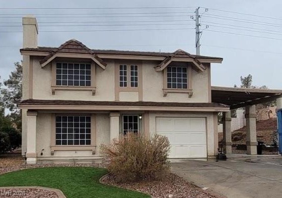 2813 Cacto Court Henderson, NV 89074 - Photo 2 of 28 View of front of home with stucco siding, a garage, driveway, and a chimney