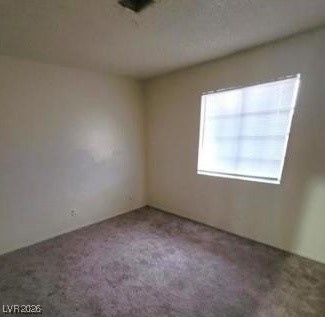 2813 Cacto Court Henderson, NV 89074 - Photo 4 of 28 View of carpeted spare room