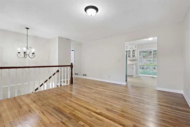 a view of a livingroom with wooden floor