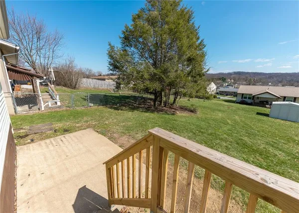 a view of a garden and lake