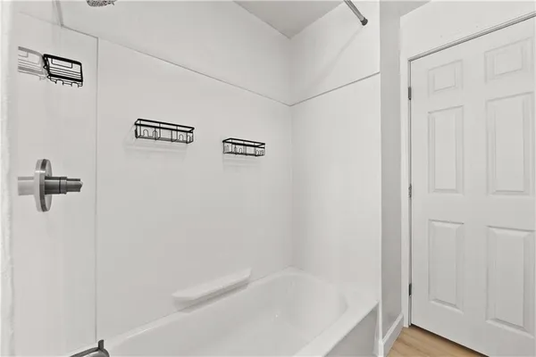 a bathroom with a bathtub