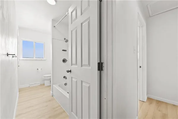 a spacious bathroom with a shower