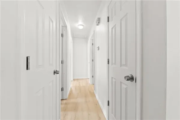 a view of a bathroom from the hallway