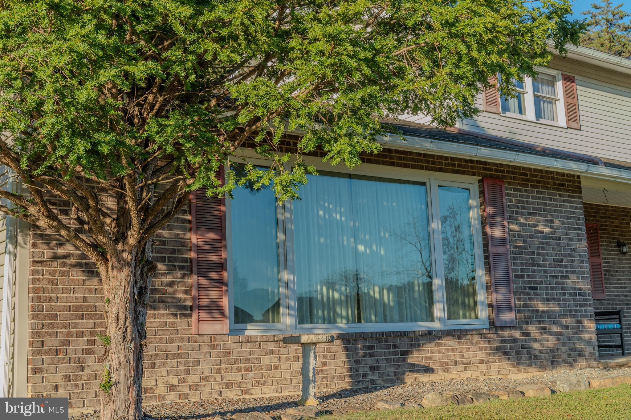 105 Shrefflers Lane McClure, PA 17841 - Photo 15 of 48 a small hut with trees in front of it