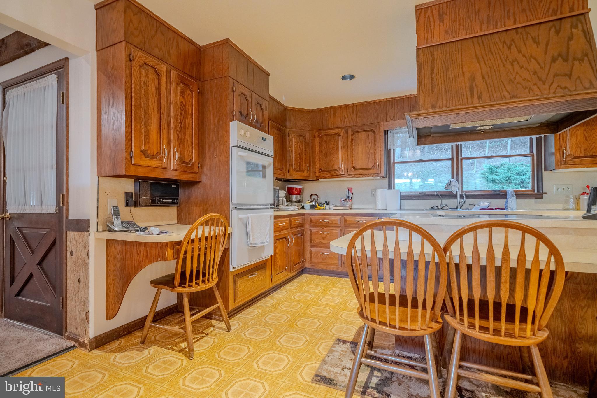 105 Shrefflers Lane McClure, PA 17841 - Photo 30 of 48 a view of a kitchen with furniture and a window