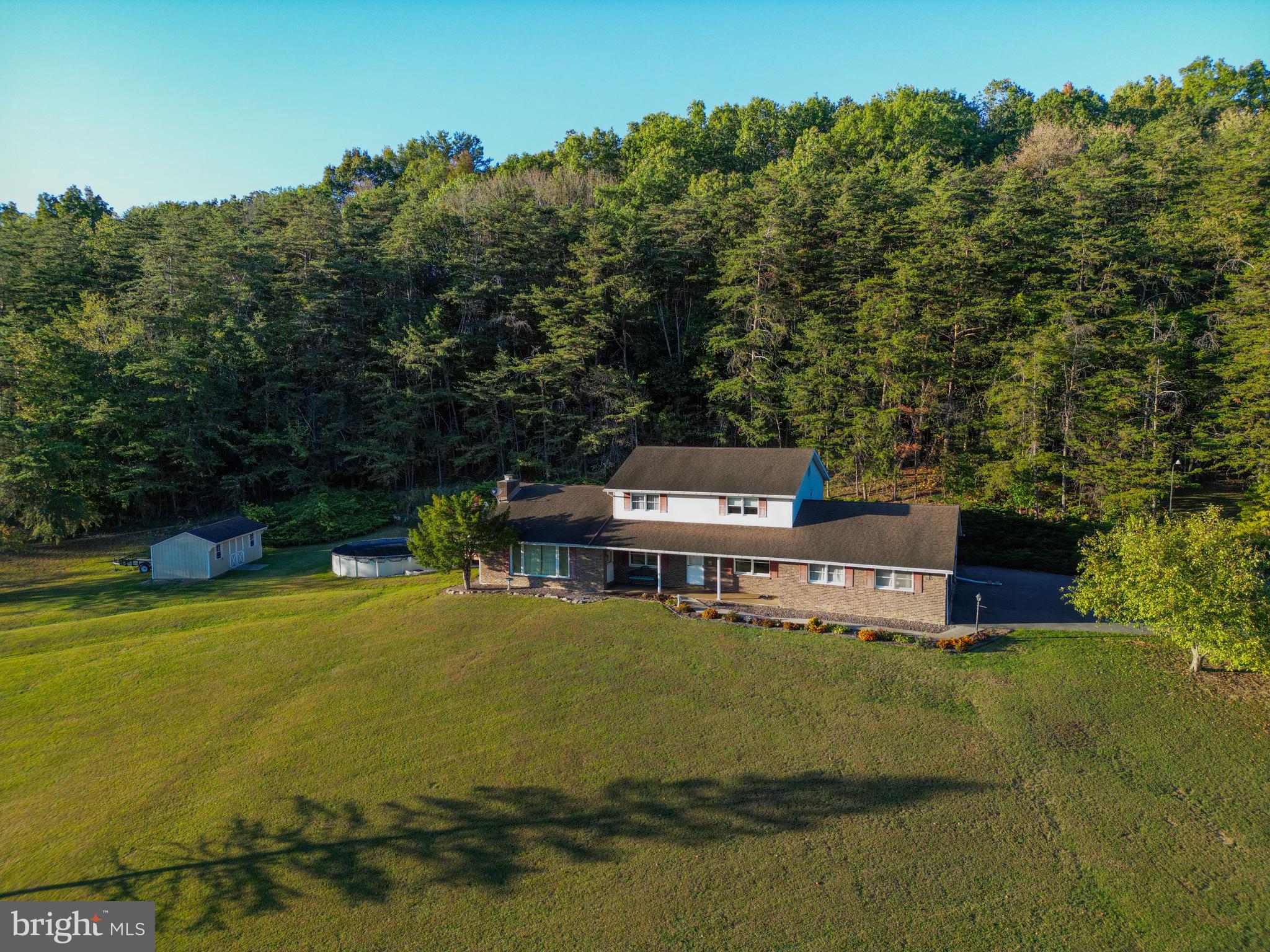 105 Shrefflers Lane McClure, PA 17841 - Photo 3 of 48 a view of a house with a yard lake view and mountain view