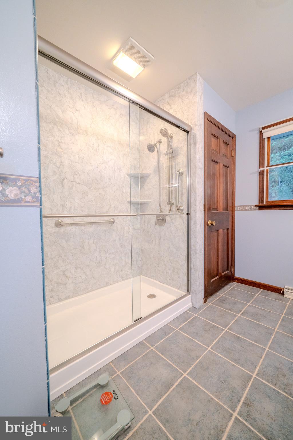 105 Shrefflers Lane McClure, PA 17841 - Photo 44 of 48 a bathroom with a bathtub and a shower