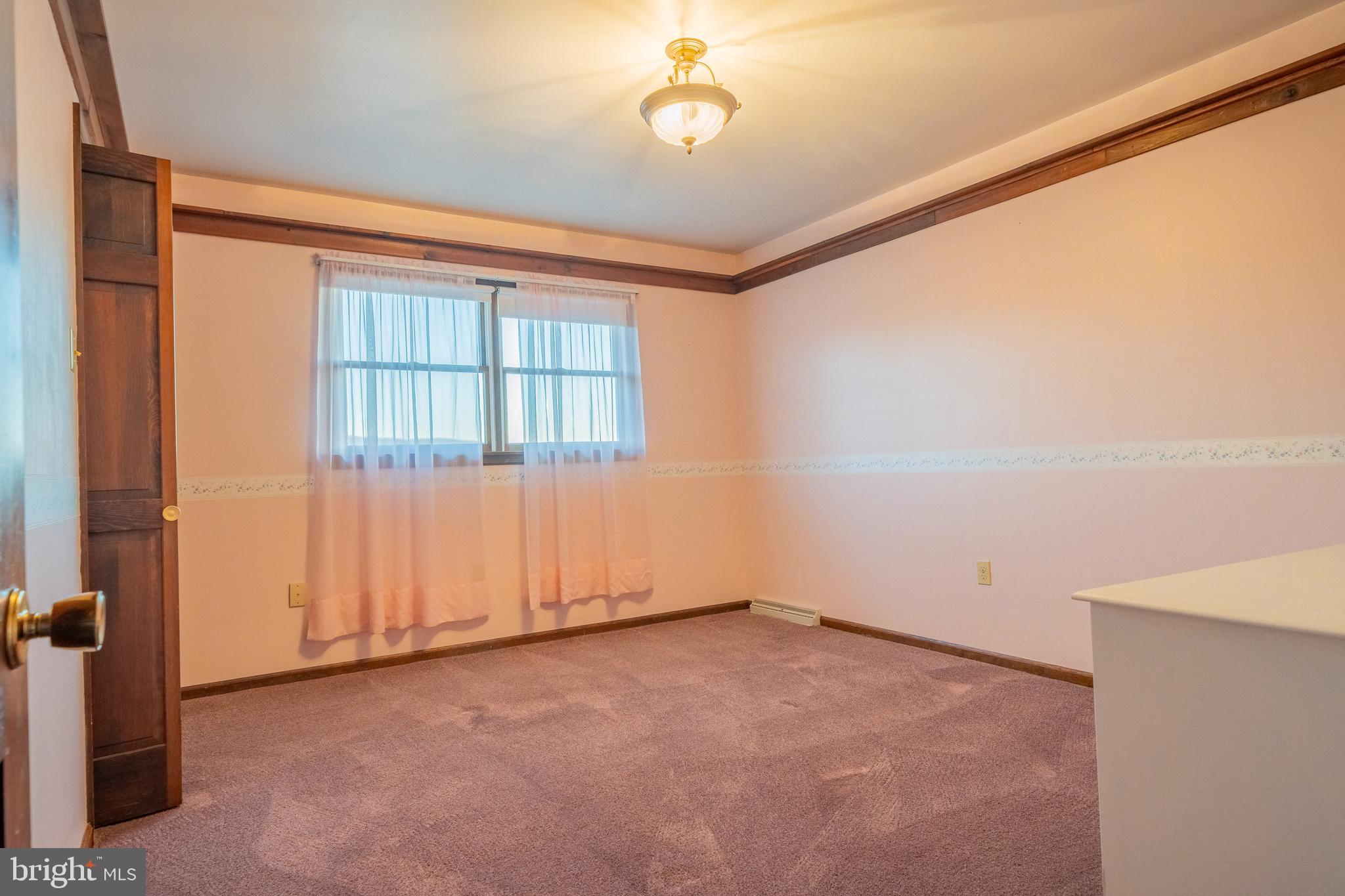 105 Shrefflers Lane McClure, PA 17841 - Photo 46 of 48 an empty room with a empty space and windows