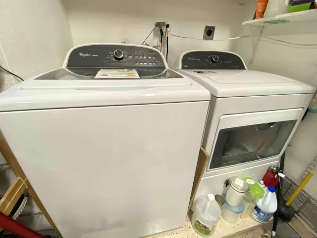 a utility room with dryer and washer
