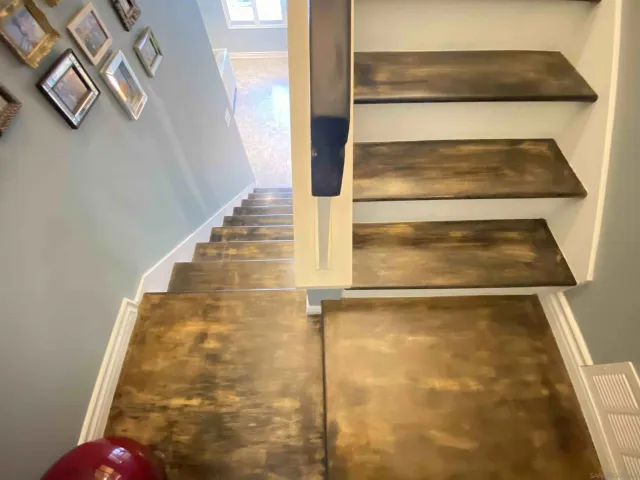 a view of staircase with white walls