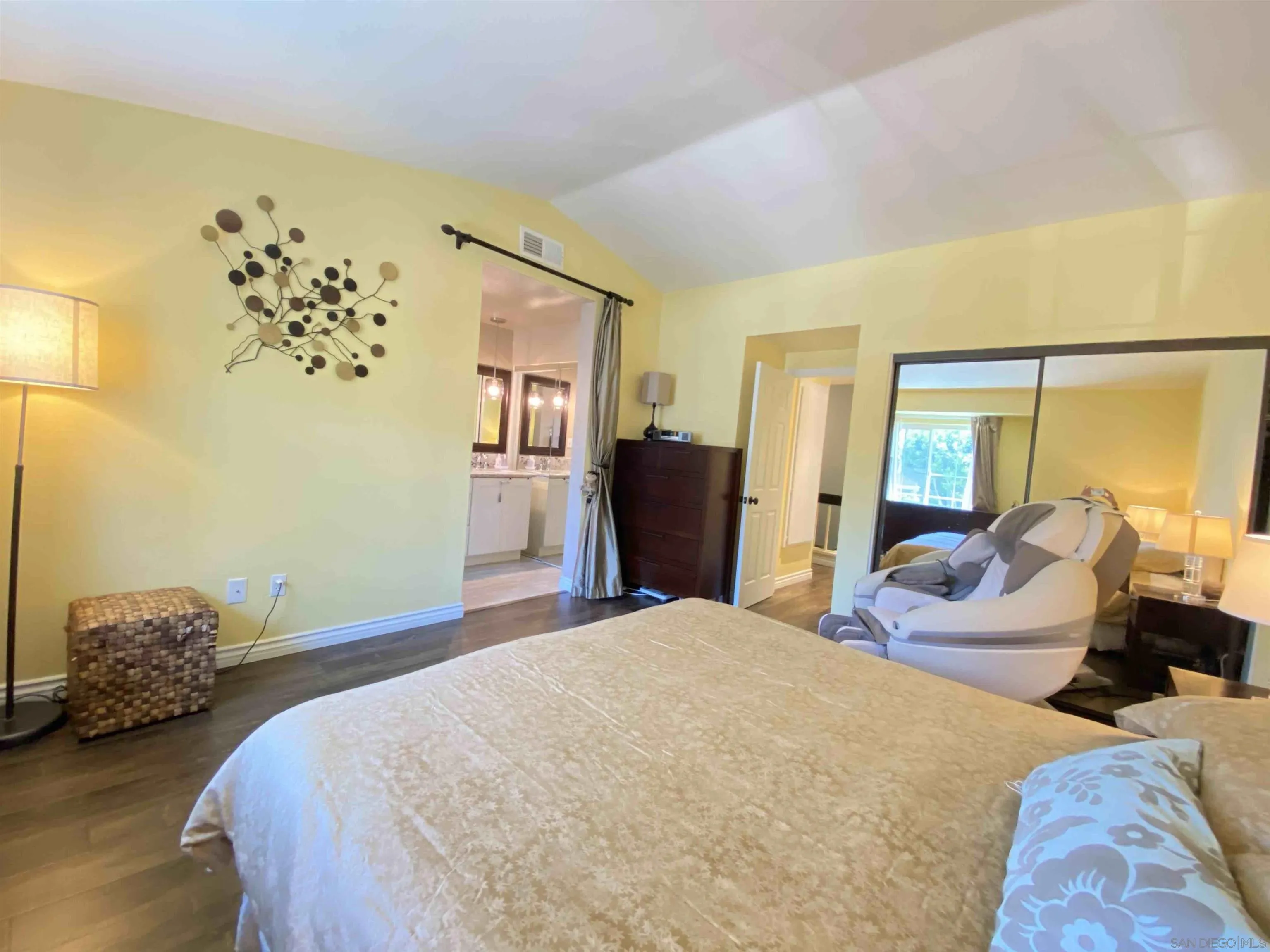 13319 Kibbings Road San Diego, CA 92130 - Photo 24 of 32 a bedroom with a bed and a couch