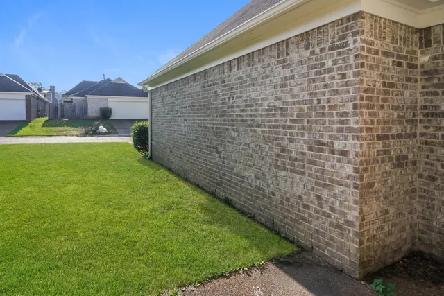 a view of a backyard with a garden