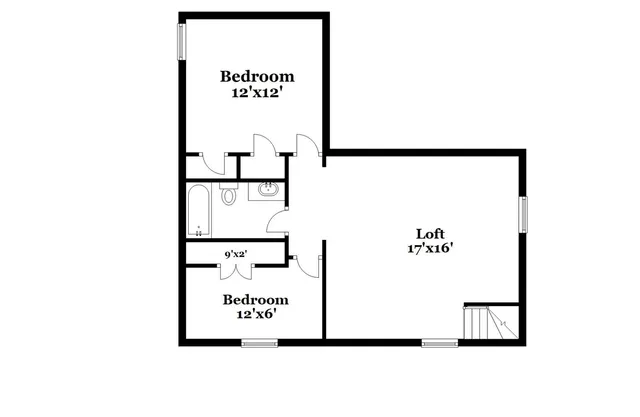 a picture of a bench in front of a wall